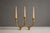 Elegant 3 arm brass candelabra featuring a minimalist and sculptural design highly characteristic of mid century...
