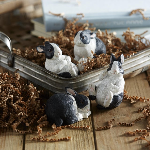 Add a whimsical touch to your spring decor with our Black and White Playful Rabbit Figurine Set. Featuring 16 pieces in...