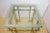 Large bevelled glass top side tables in a combination of brass and chromed steel. Superior quality, in the style of Maison...