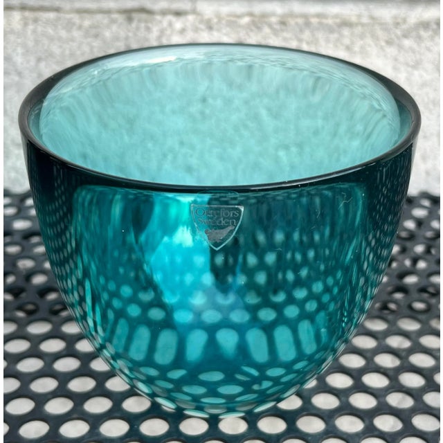 Vintage art glass decorative objet bowl by Orrefors Sweden. Thick turquoise crystal glass in beautiful condition with...