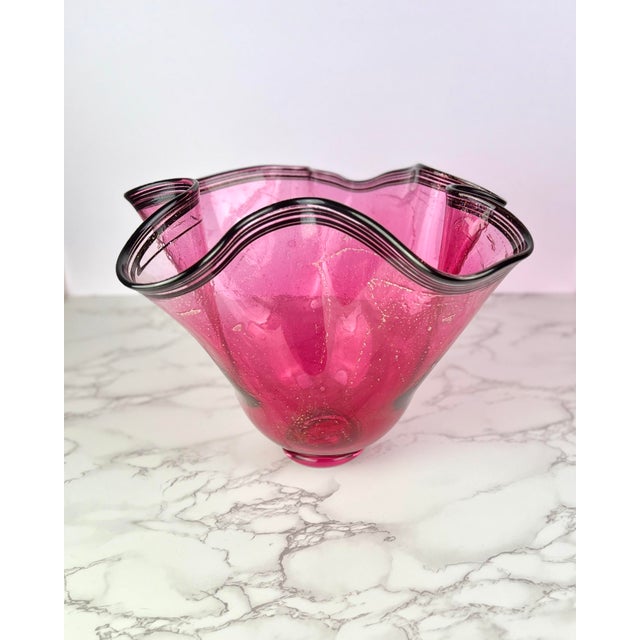 An extraordinary 1998 studio art glass centerpiece bowl by renowned American glassblower Paul Bendzunas. Crafted in a...