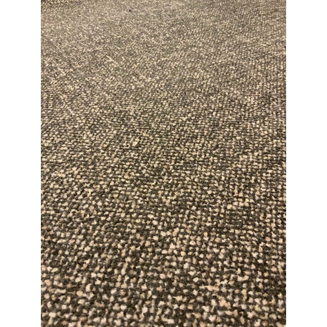 This solid woven has a multicolor taupe, gray, cream, and beige colorway. Its hand is soft, and it is suitable for...