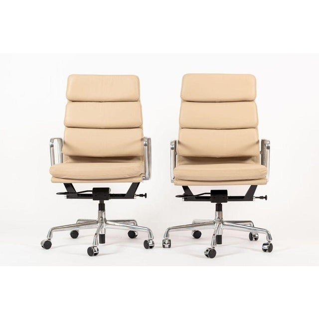These authentic Eames for Herman Miller Soft Pad Executive Height office chairs from the Aluminum Group Collection were...