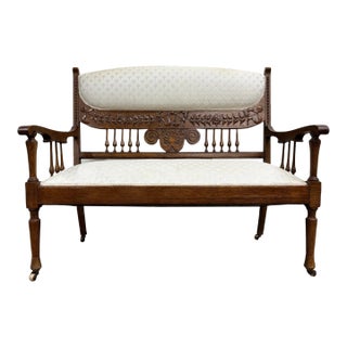 Antique Carved Spindle Back Carved Upholstered Settee For Sale