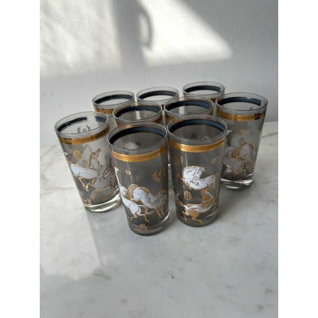 Vintage set of Midcentury Culver "Ming/Wild Horses" pattern highball glasses, comprising nine tumblers. Crafted in the...