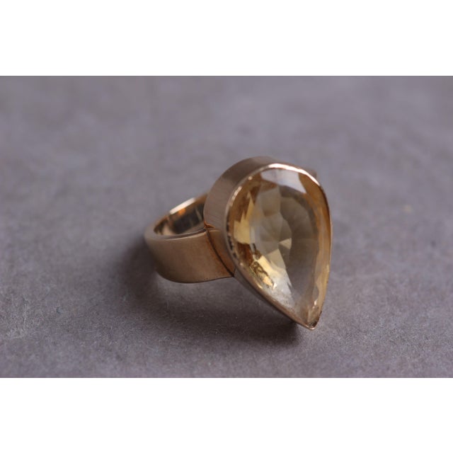 Beautiful 18-karat gold ring with a teardrop-shaped citrine. Very good condition with a light, normal patina. Ring size...
