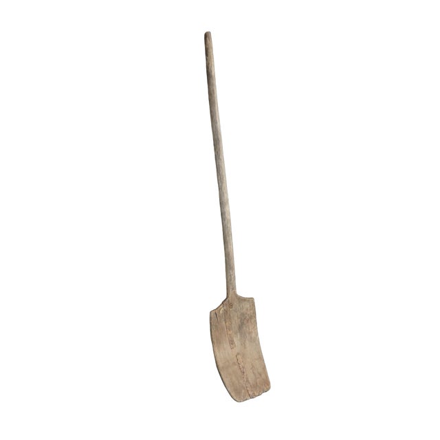 Antique 19th century primitive hand-hewn wooden country farmhouse grain shovel. Dimensions: 10" x 1.5" x 57.5" (W x D x H)