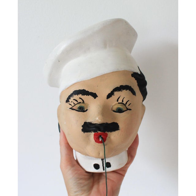 Vintage chalkware chef string holder wall hanging. No makers mark. Age wear to painted finish. Small nicks in chalkware.