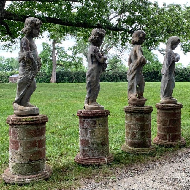 Set of Four Lead Garden Statues Depicting the Four Seasons Chairish