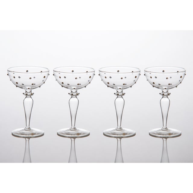 The stemmed coupe for champagne was a very popular glass during the "Roaring Twenties". Gatsby himself would have enjoyed...