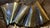 This metal silver and gold tone wave design wall art is in the style of metal artist Curtis Jere. This piece - with its...