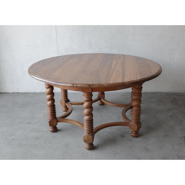 This European beauty is large in size and character. This grand table features a large round top supported by six barley...