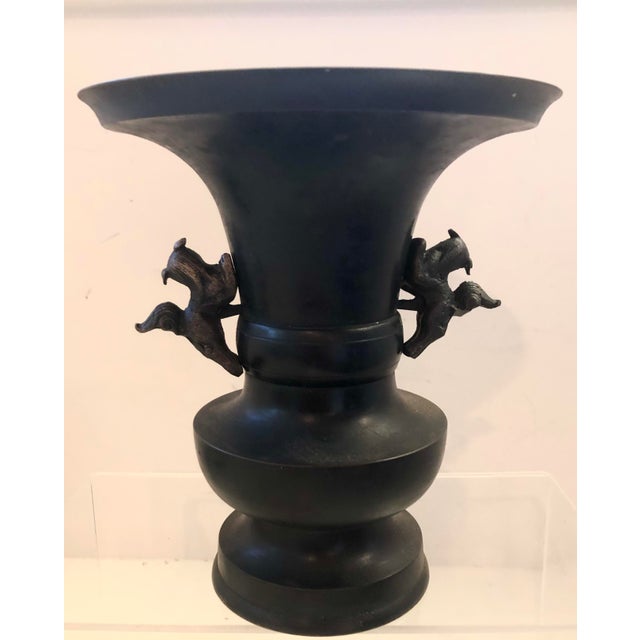 A classic Meiji era trumpet shape bronze vase. - Flared mouth - elongated neck - removable handles on each side in foodog...