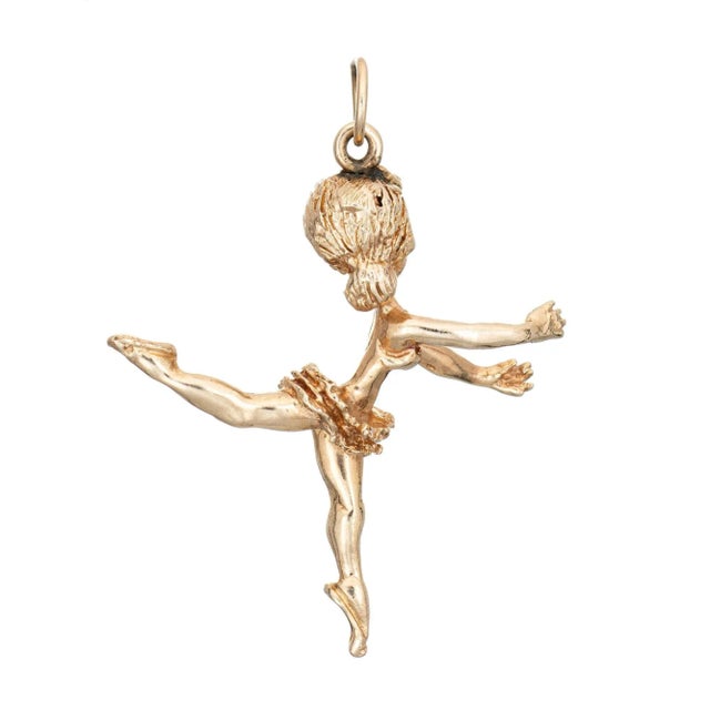 Finely detailed vintage Ballerina charm (circa 1980s to 1990s) crafted in 14k yellow gold. The nicely detailed charm...