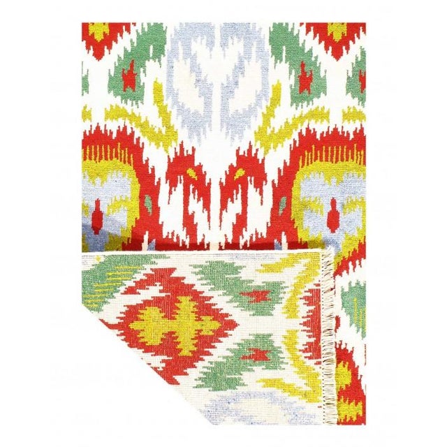 Handmade modern 100% lamb's wool Ikat rug. Made with the finest material. The timeless style of this rug will give your...