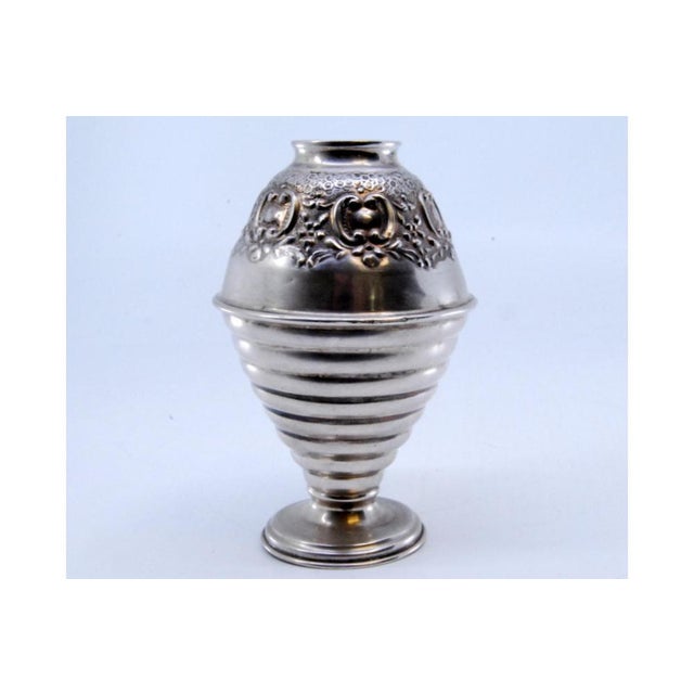 Vase in Embossed Silver with Circular Friezes Edge, in Very Good conditions. Designed 1920 to 1949 This piece has an...