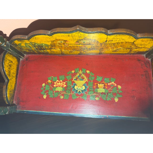 Beautiful, authentic Tibetan hand-painted cabinet featuring vibrant traditional artwork and intricate detailing. This...