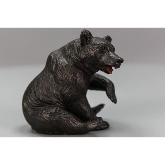 - Antique black forest carved seated bear sculpture. - An adorable and masterfully hand-carved figure of a seated bear. -...