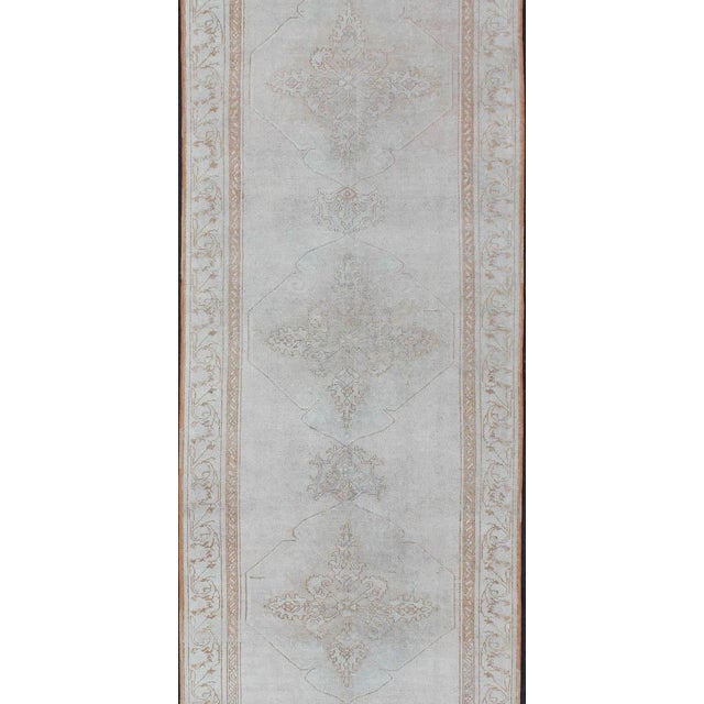 Measures: 3'2 x 10'5. Turkish Oushak Runner in Pale Ice Blue, Ivory, and Faint Taupe Subtle Medallions. Keivan Woven Arts...