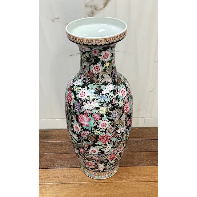 Chinese Qing Dynasty Imperial Famille Noir Porcelain Vases, Those bottle-shaped vases with an elongated flared neck are...