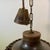 Rare and large perforated stoneware pendant designed by ceramist Aksel Larsen for Axella in the 1970s. Shaped in robust...