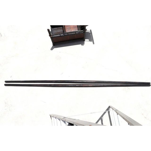 Rare antique Asian Wooden and Wicker Sedan Chair, comes with two long wooden poles that attach to the sides of the chair,...