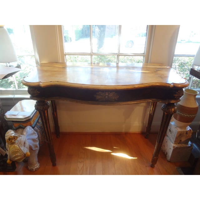 18th Century Italian Louis XVI Ebonized And Parcel Gilt Console Table. This Stunning Free Standing Genovese Console Table...