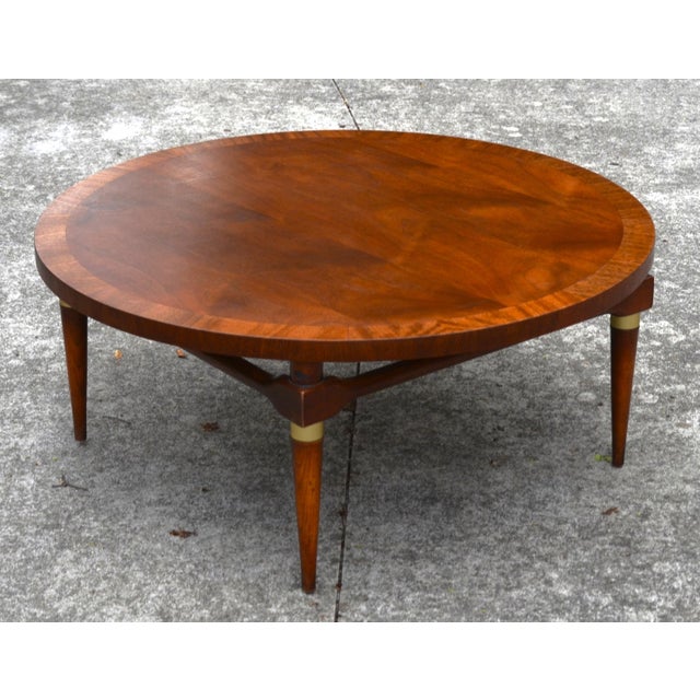 Vintage Mid-Century Modern coffee table by Lane Furniture Company, dated 1957 This round table by Lane was made in...
