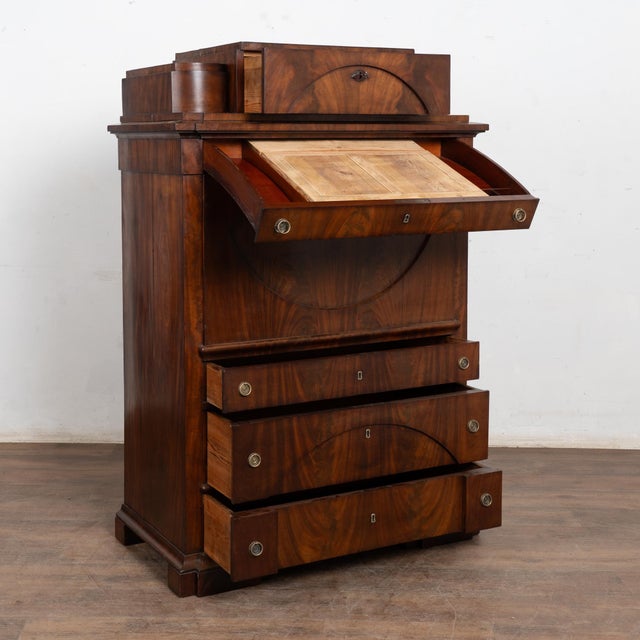 19th century Danish Biedermeier-style secretary or "bureau" crafted in mahogany veneer. This short, stately bureau...