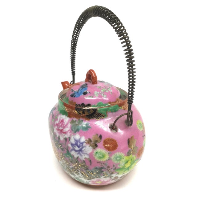 Hand painted delicate porcelain with rich colors and superb details. Use this teapot in your space to impress your guests....