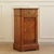 This bedside table was created around the mid-19th century in the Louis Philippe style and exhibits the characteristic...