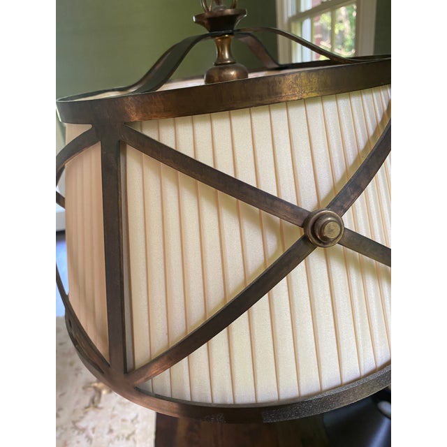 Beautiful Vaughan chandelier with bronzed brass criss cross accents. Amazing condition. Redecorating our house which is...