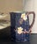 English majolica pitcher made by Joseph Holdcroft in the 1890's. The cobalt blue pitcher has a bark form, it is covered...