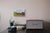 Contemporary While They Work by Stephanie Hartshorn | Oil on Wood Panel Rustic barn with farm equipment and greenery For Sale - Image 3 of 4