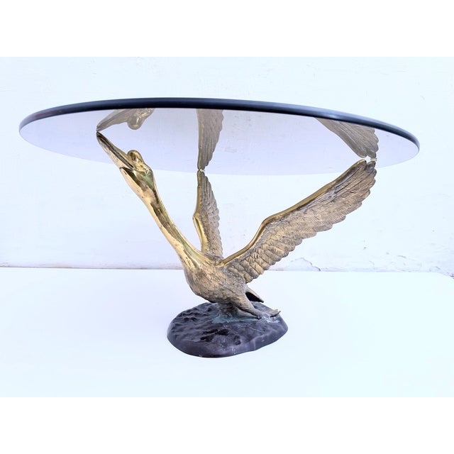 Coffee table from the 1970s/80s. Metal, removable round smoked glass top (80 x 1 cm). Good used condition. Light patina....