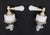 Traditional style luxury bathroom fixture set featuring two faucet handles and a towel bar. Stamped Spain. Good condition...