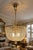 A stunning crystal chandelier dating from the 1950s, offering a refined and luminous presence, ideal for enhancing an...