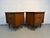A handsome pair of mid-century modern walnut nightstands featuring beautifully crafted dovetail drawers. Showcasing clean...