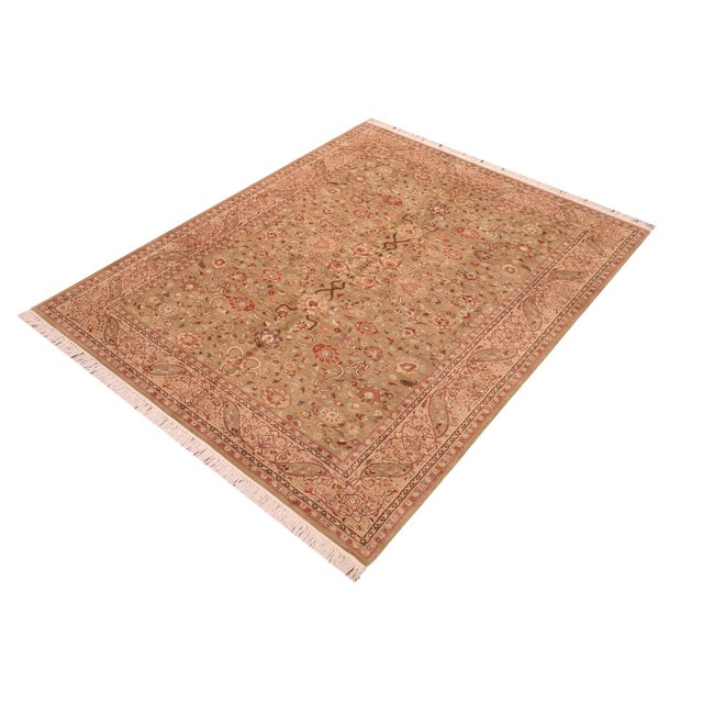 Designed with mesmerizing intricacy and gorgeous color palette, this hand-knotted masterpiece demonstrates the beauty and...