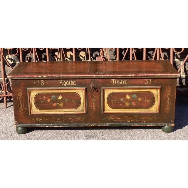 This large and handsome painted dovetailed trunk commemorates either the birth or marriage of Agatha Taster in 1831. The...