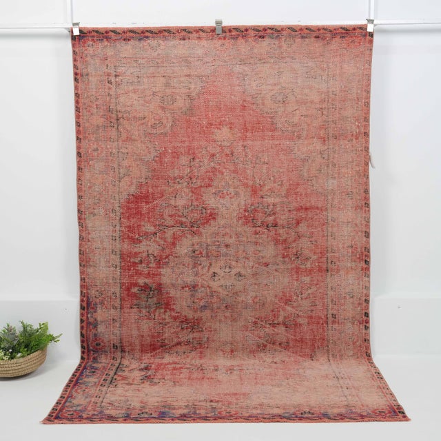 Vintage Hand-Knotted area rug is a semi-antique vintage area rug. The '70s Eastern region of Anatolian's unique rug is...