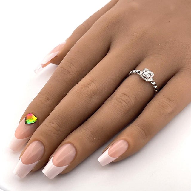 Dainty 14k White Gold Diamond Ring This delicate diamond ring is a true beauty, crafted from 14k white gold and featuring...