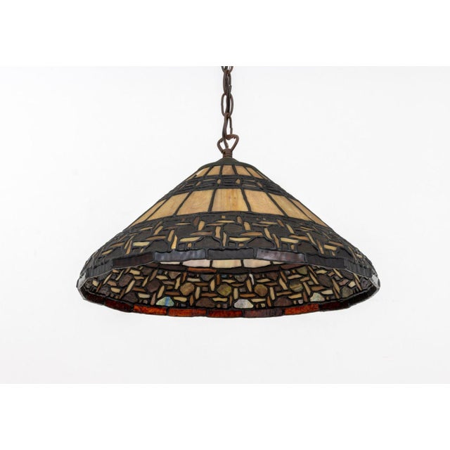 Tiffany Style Stained Glass Pendant Lamp, two light sockets, cream ground with braided motif around rim. 9" H x 16"...