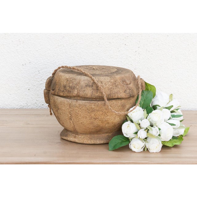 Discover the rustic charm and enduring craftsmanship of traditional artistry with this delightful wooden bowl with lid and...