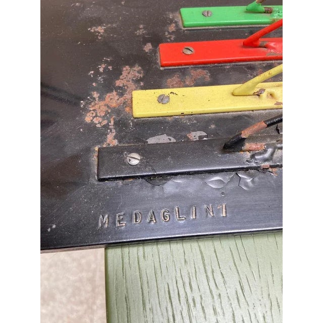 Sculpture A16 Projection and vibration - Medaglini (1939-2011) Drawn iron and cast iron base H90xW62xD17 Signed on the...