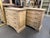 This charming pair of antique Italian pine chests exudes rustic elegance with their warm, weathered finish and timeless...