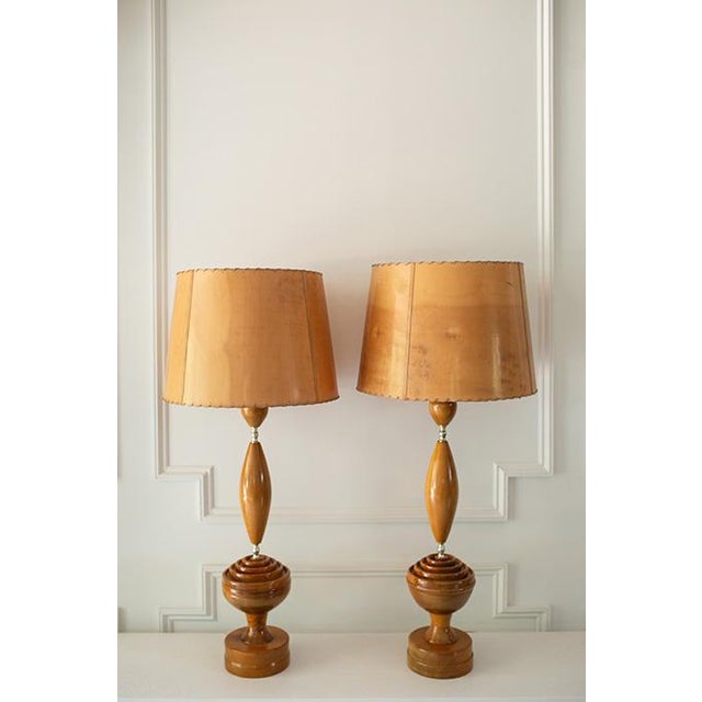 These vintage table lamps, with their warm turned Myrtlewood base and original scalloped-edge shades, bring a timeless...