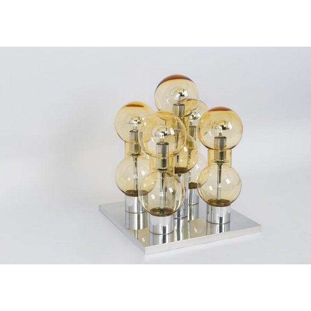 Fantastic chrome mid-century flush mount by doria, germany, manufactured circa 1970-1979 with 5 glass cylinders suspended...