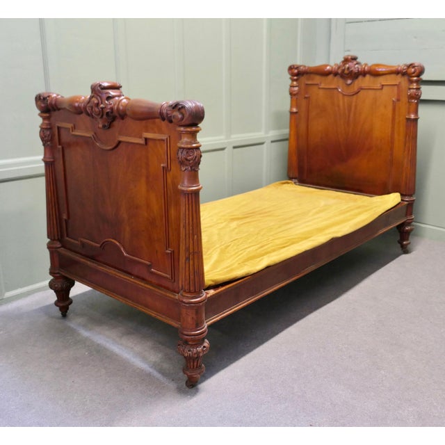 19th Century French Empire Style Bed or Single Bed. The bed is made in beautiful cherry wood it has a high headboard and...
