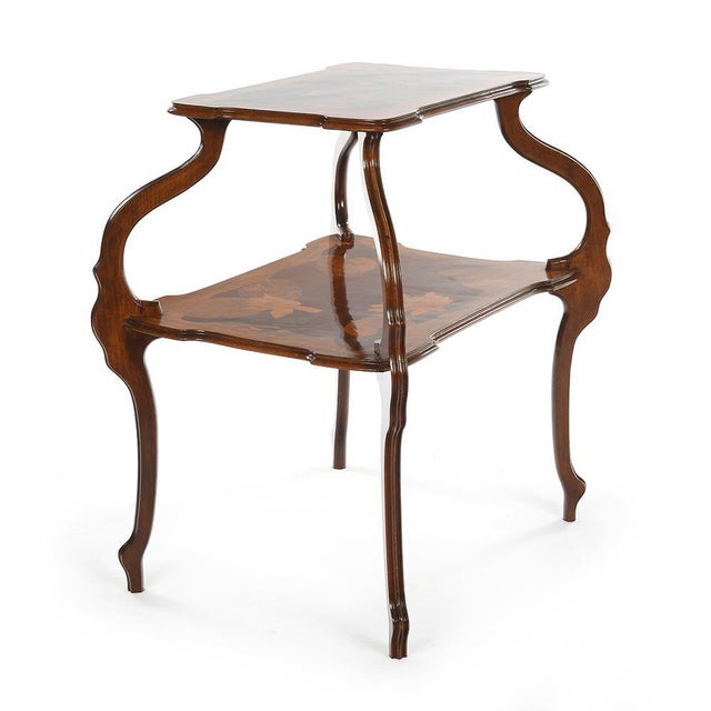 Art nouveau style Gallé marquetry table bought by Julien Cohen and restored by craftsmen. This piece is designed in the...